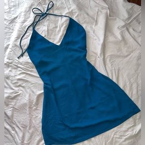 Blue mini dress with a halter tie is perfect for spring/summer.